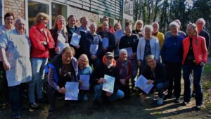 een groep hospitaleros die de cursus van de werkgroep hospitaleren met succes afsloot