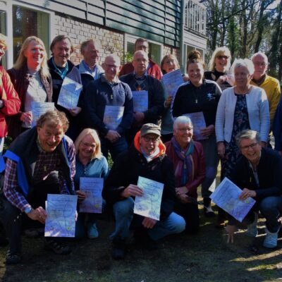 een groep hospitaleros die de cursus van de werkgroep hospitaleren met succes afsloot